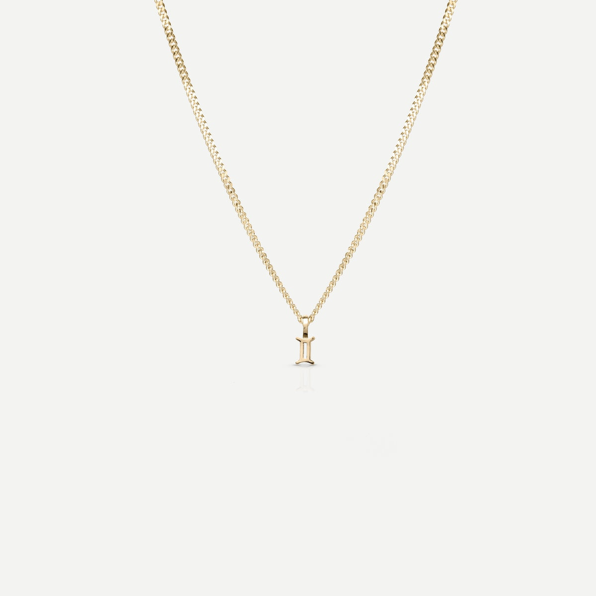 Solid gold and silver jewellery: A single Kate & Kole hand finished zodiac necklace in 9ct yellow gold